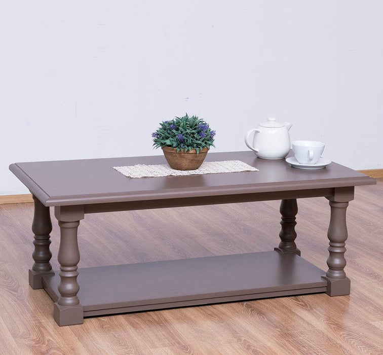 Couchtisch aus Massivholz mit gedrechselten Beinen und Ablage -