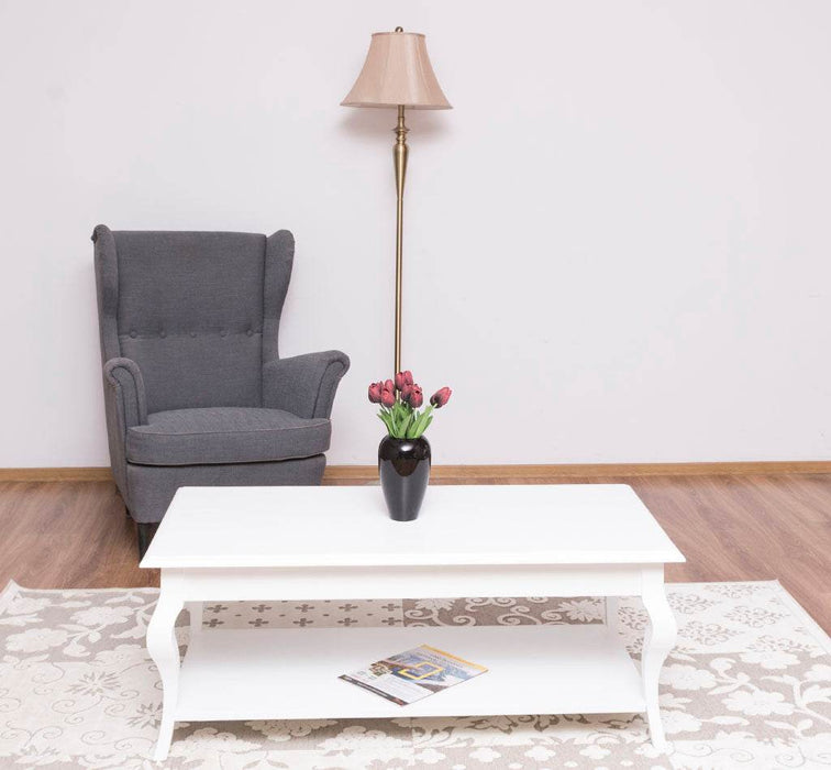 Couchtisch aus Massivholz mit geschwungenen Beinen -