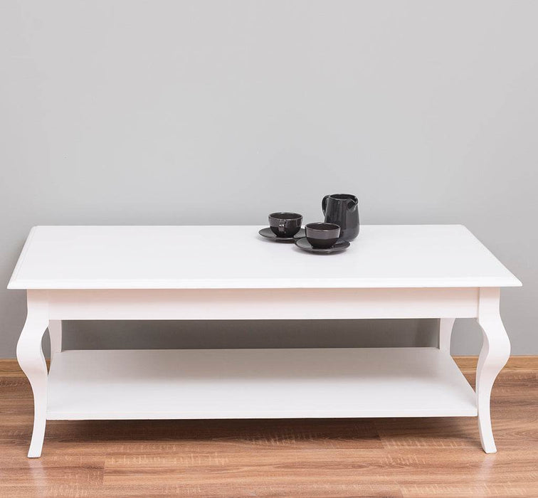 Couchtisch aus Massivholz mit geschwungenen Beinen -