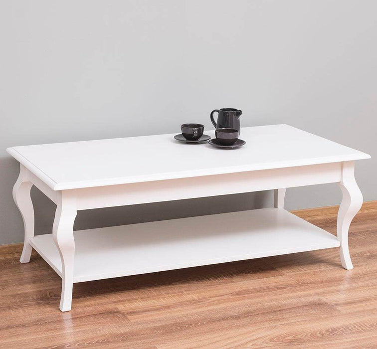 Couchtisch aus Massivholz mit geschwungenen Beinen -