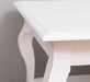 Couchtisch aus Massivholz mit geschwungenen Beinen -