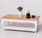 Couchtisch aus Massivholz mit geschwungenen Beinen -