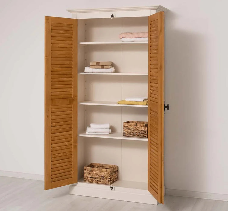 Kleiderschrank aus Massivholz mit Lamellentüren und externem Verschluss