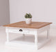 Kleiner Couchtisch aus Massivholz im Landhausstil mit Schublade -