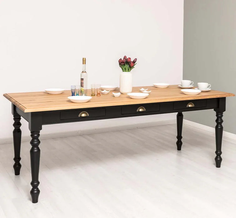 Massiver Esstisch mit drei Schubladen in verschiedenen Größen & Farben