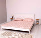 Schlafzimmer-Set bestehend aus Massivholzbett 180 und zwei Nachttischen - 