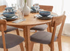 Minimalistische Essgruppe aus massiver Eiche | Runder Esstisch Orbetello + 4 x Polsterstuhl Leon - 