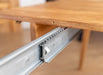 Minimalistische Essgruppe aus massiver Eiche | Runder Ausziehtisch Orbetello + 4x Polsterstuhl Leon - 